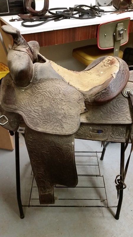 side view rose pattern saddle before restoration